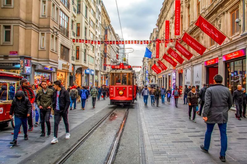 A nostalgic red tram in Taksim Istiklal Street in Istanbul is well worth the visit.