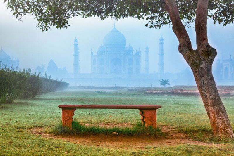 The Taj Mahal shrouded in fog, Agra.
