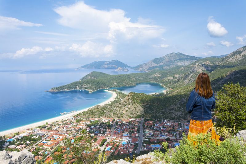 Woman watching Oudeniz Bay from Lycian Way.