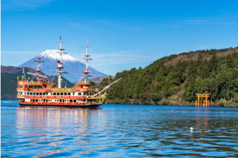 An old-fashioned boat cruising on Mount Fuji in Hakone, Japan.