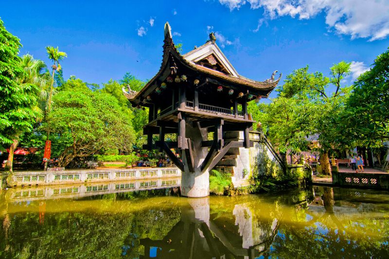 The view of the old One Pillar Pagoda on a clear day in Hanoi.