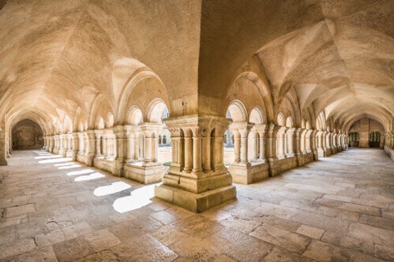 A view of the cloister courtyard in the famous Cistercian Abbey of Fontenay in Burgundy.