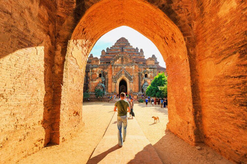 A tourist visiting the Dhammayangyi Temple, a popular ancient temple at Bagan.