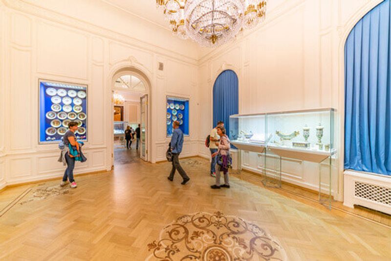 Visitors enjoy the sights of the Shuvalov Palace Faberge Museum.