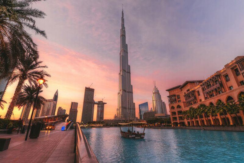 An Abra boat with Burj Khalifa in the background.