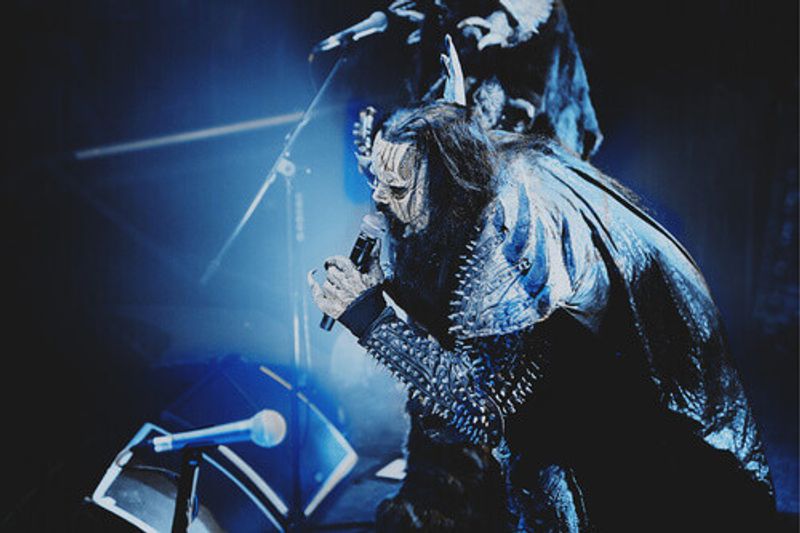 The metal band Lordi performs on stage.