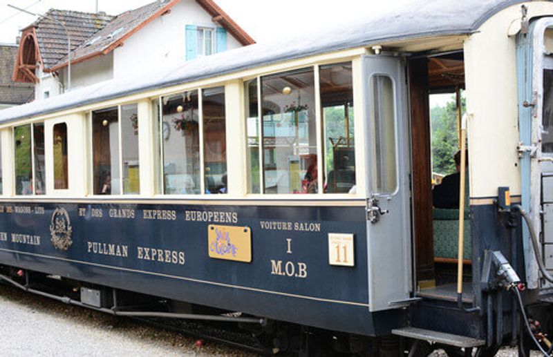 The luxury tourist train departs from Montreux to stops in Gruyere for cheese and chocolate factory tours in Switzerland.