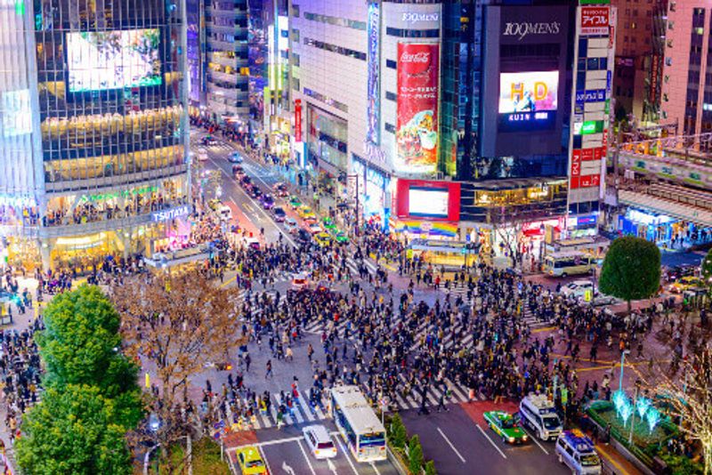 Pedestrians cross at Shibuya Crossing, one of the worlds most famous pedestrian crossings in the world.