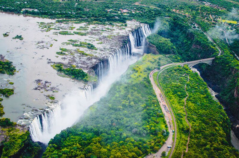 Victoria Falls, also known as Tokaleya Tonga Mosi-oa-Tunya or The Smoke that Thunders a border between Zambia and Zimbabwe.