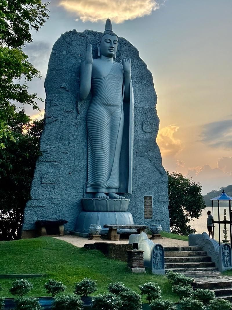 Buddha statue overlooking Polonnaruwa Lake (photo taken by Dianne on tour)