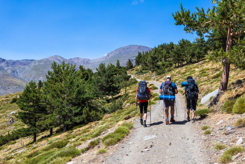 People hike in the Sierra Nevada Trail.