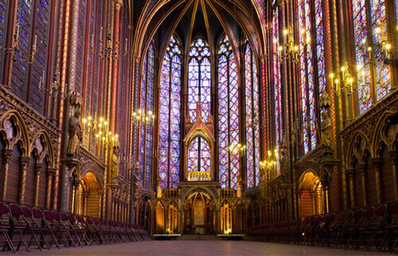 The illuminated interior of the Sainte Chapelle in Paris.