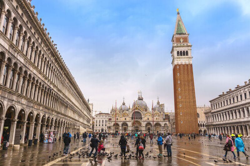 The Piazza San Marco with San Marco Basilica and San Marco Campanile in the background.