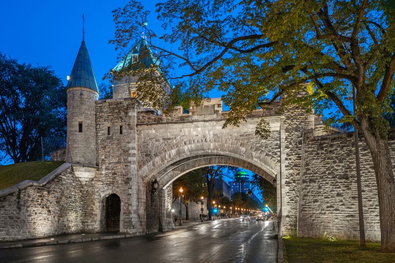 St. Louis Gate or Porte Saint Louis at night