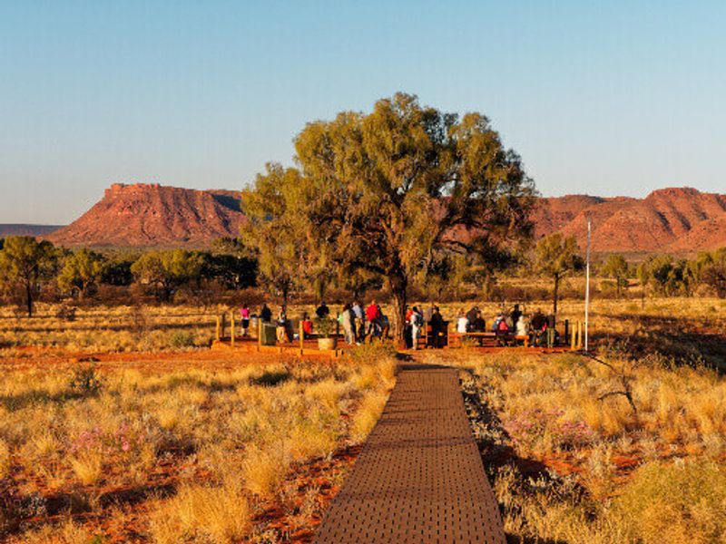 Tourists at the Kings Canyon Resort Sunset viewing area, in the West Macdonnell Ranges.