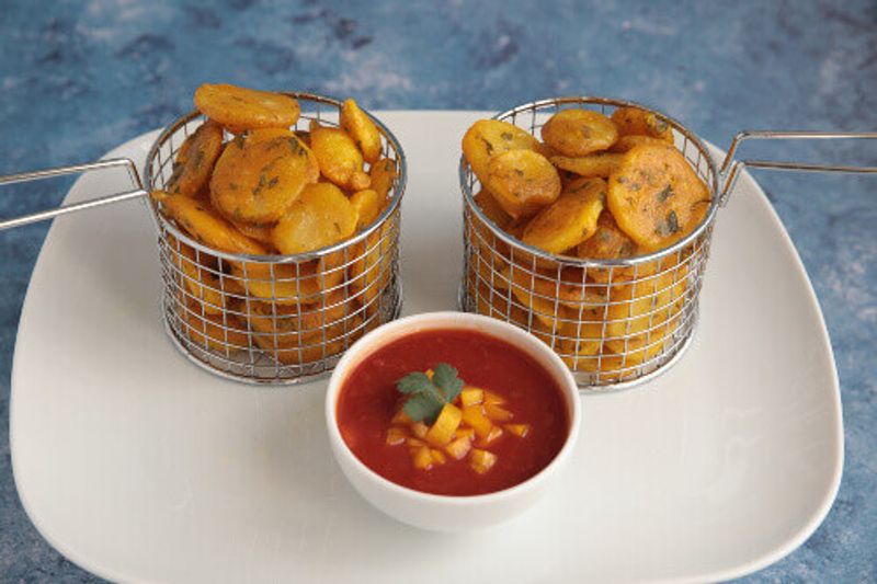 Crispy Kenyan Bhajia with chilli tomato sauce in Nairobi.