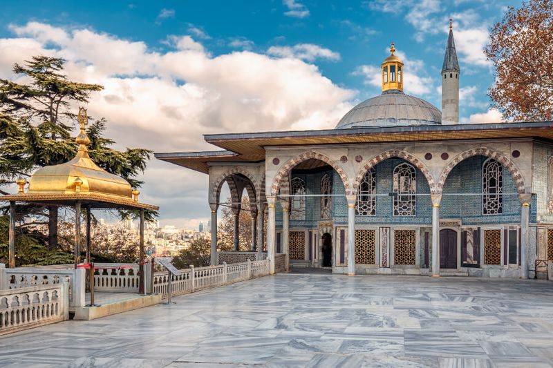 The Topkapi Palace features details such as marble floors and intricate gold details.