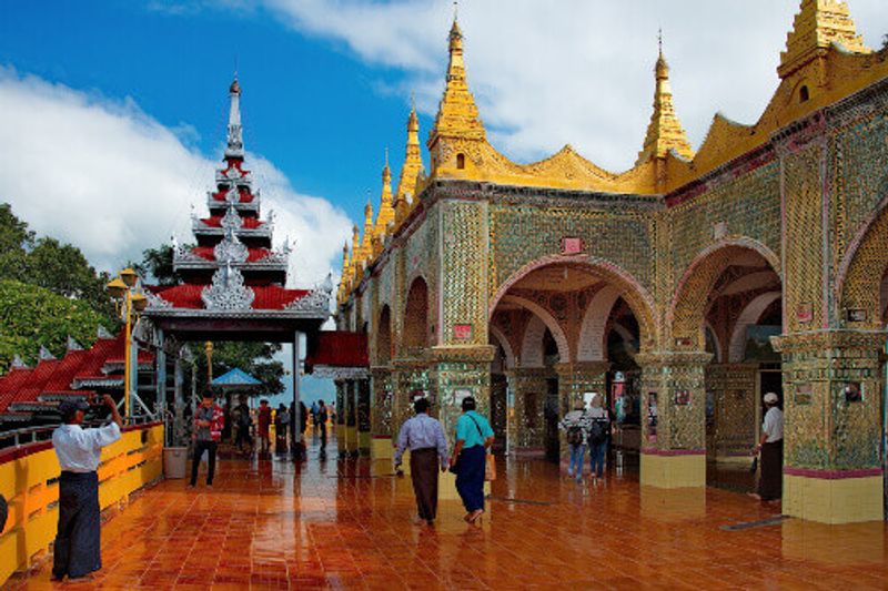 At the top of Mandalay Hill, locals and tourists visit the Sutaungpyei Pagoda.