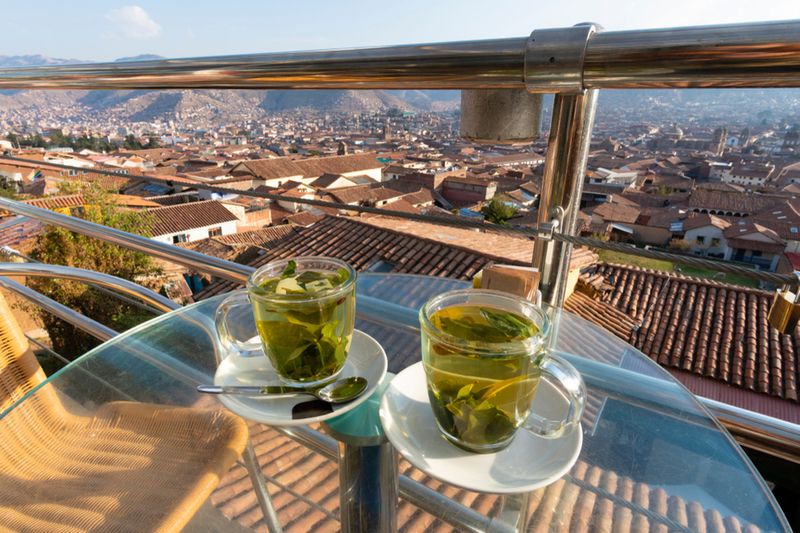 Cups of tea against the Peruvian skyline.