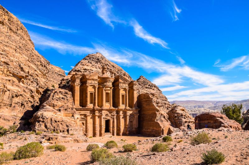 The amazing Ad Deir Monastery on a beautiful morning in Petra, Jordan.