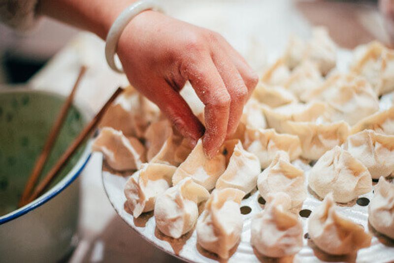 Dumplings are handmade and eaten at Chinese New Year.