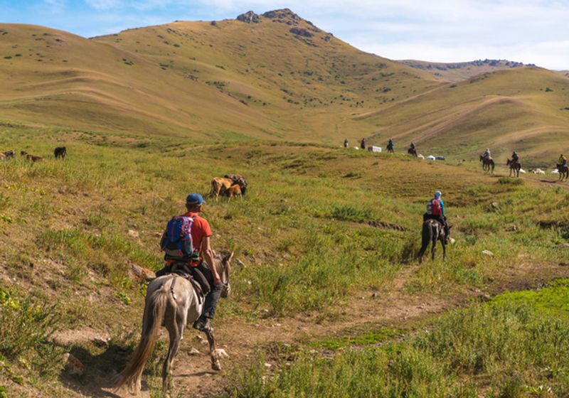 Horse riding in the Lake Song Kol area in Kyrgyzstan