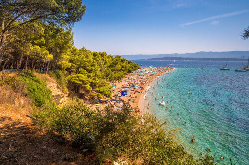 The famous Zlatni Rat Beach in Bol, located on the Island of Brac.