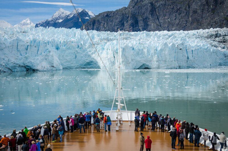 Passengers get a close-up view of the majestic glaciers as they sail in the Glacier Bay National Park and Preserve.