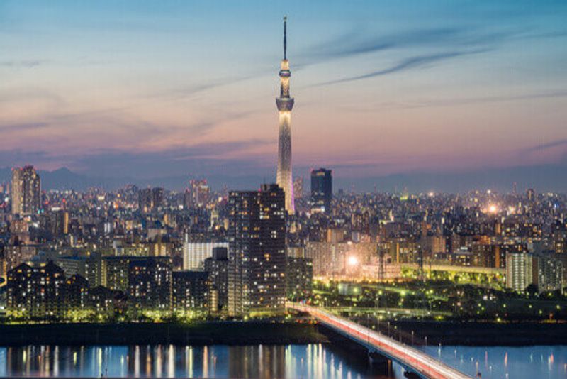 The Tokyo skyline at sunset, including the Tokyo Skytree.