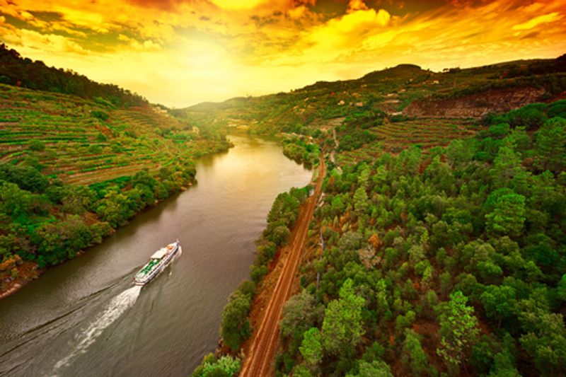 The immense beauty of Douro Valley River at sunset.