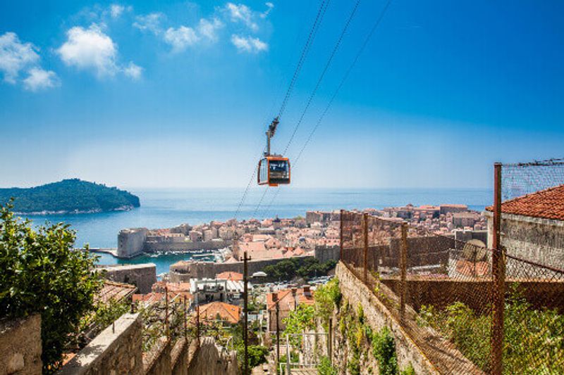 View of Dubrovnik City and a cable car taken from Mount Srd in Dubrovnik.