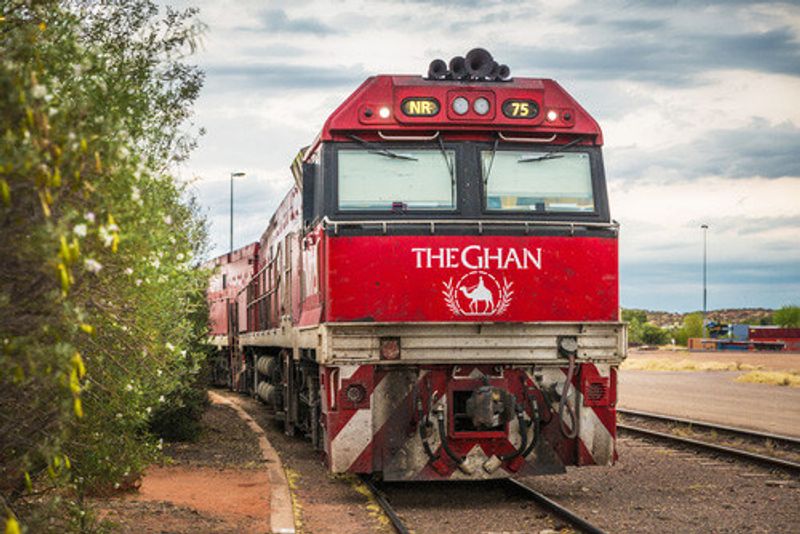 The Ghan train travelling through Alice Springs.