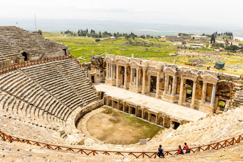 Tourists visit the Amphitheatre in Hierapolis.