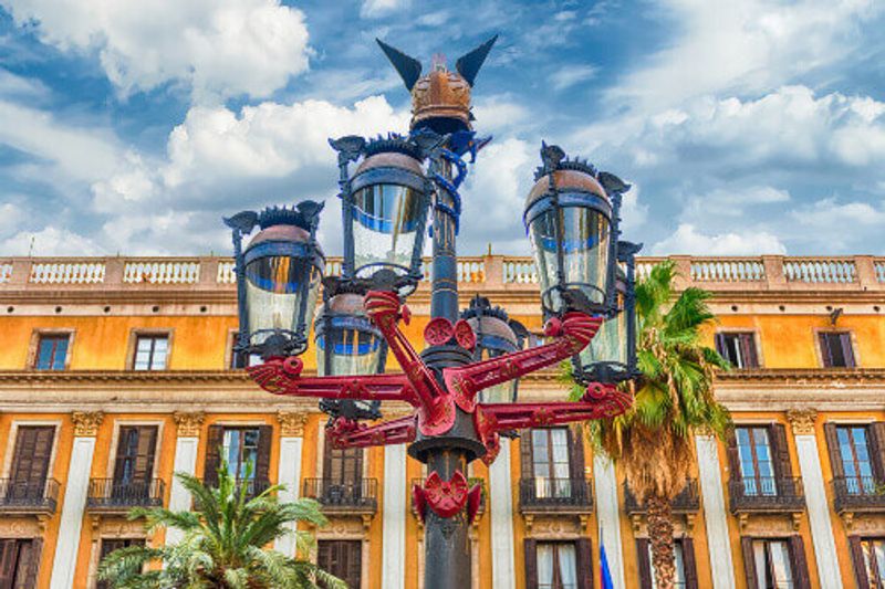 Lantern designed by Antonio Gaudi in Placa Reial, the iconic square in the Gothic Quarter.