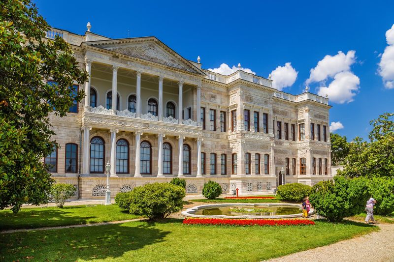 The inside of the Dolmabahce Palace boasts stunning architecture and scenic views.