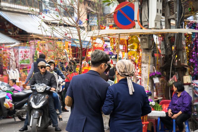 Locals buying decorations and flowers in preparation for the Vietnamese Lunar New Year