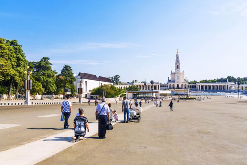 People visit The Miracle of the Sun, or Cova sa Iria Fatima, Portugal.