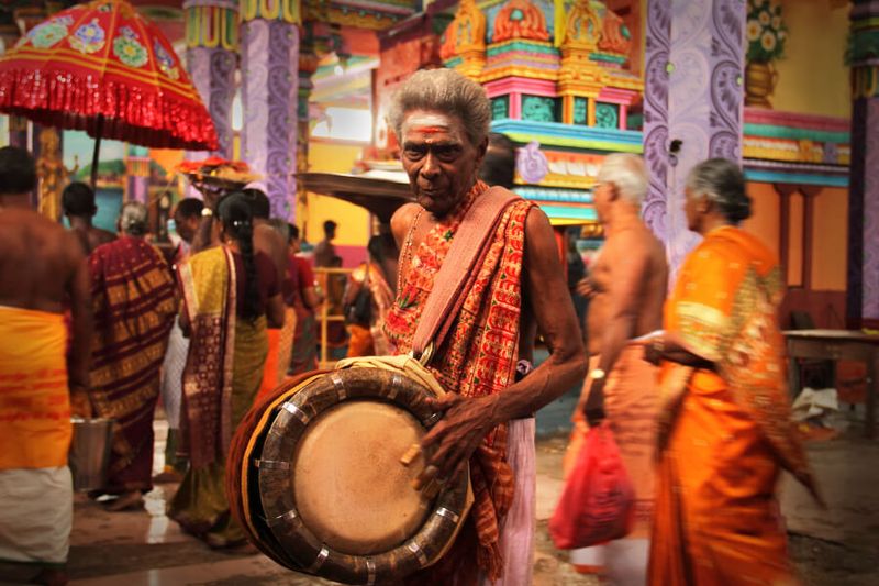 Drum player at a colourful Hindu festival in Nainativu Nagapooshani Amman Temple in Sri Lanka