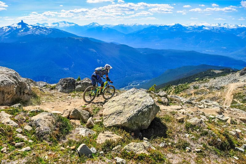 Extreme biker on top of the World Trail in the Whistler Bike Park