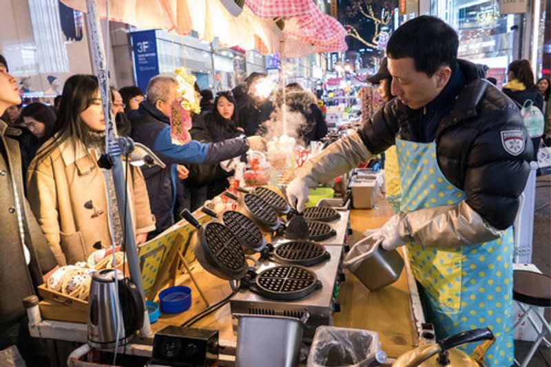 The bustling Myeongdong Market in Seoul, South Korea.