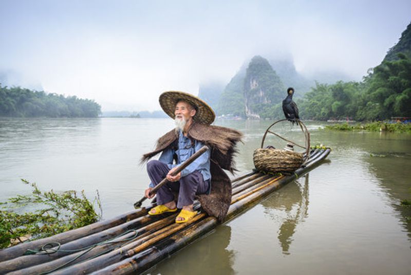An elderly fisherman on the Li River, Guilin.