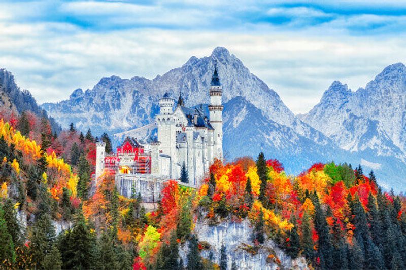 The beautiful Neuschwanstein Castle during autumn in Bavaria.