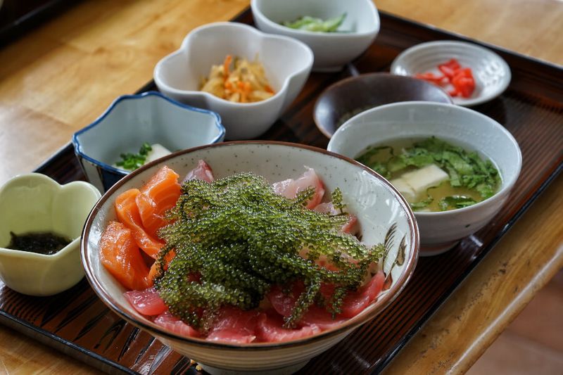 A typical healthy Okinawan lunch set consisting of seaweed, fish and other vegetables.