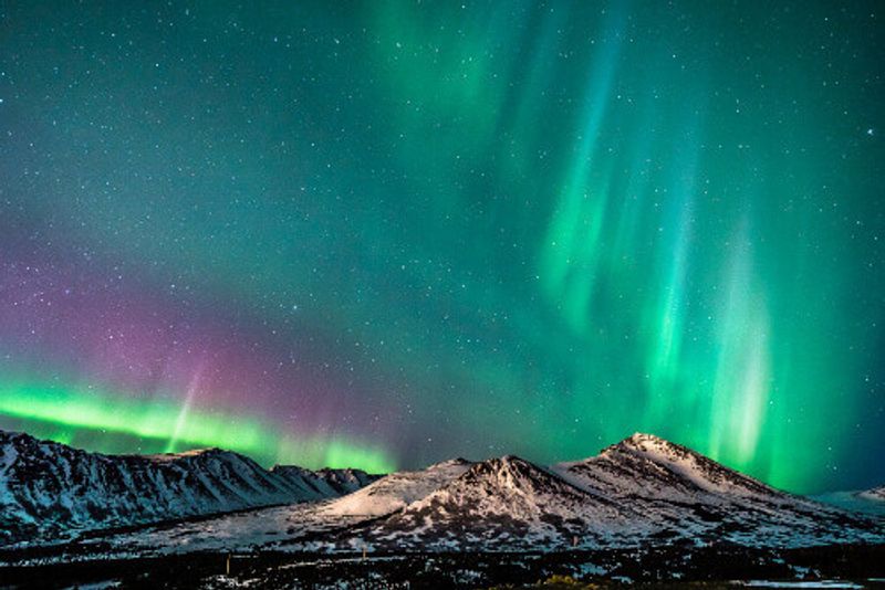 Northern lights over the Chugach Mountains in Anchorage.