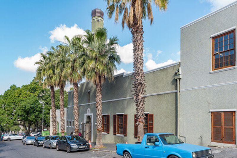 A street scene with the historic Auwal Masjid in the Bo-Kaap District of Cape Town, South Africa.