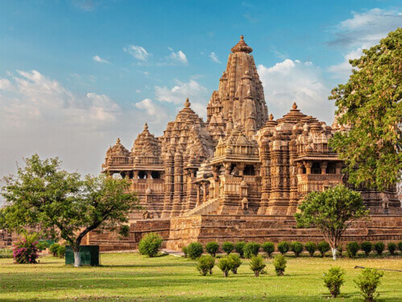 The Indian Madhya Pradesh tourist landmark of  Kandariya Mahadeva Temple in Khajuraho, India.