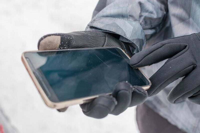 Ensure your gloves are designed to operate screens and protect against snow.