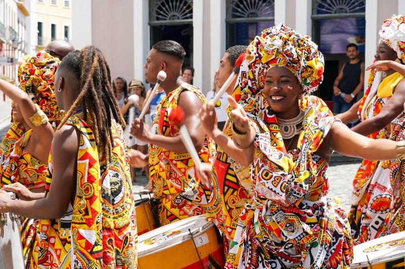 Parade with traditional African costumes at the Carnival of Bahai on the streets of Salvadore Bahia in Brazil.