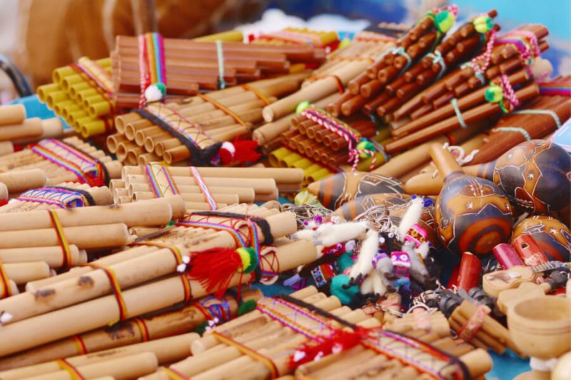 Zampona and other typical Andean musical instruments in the market.