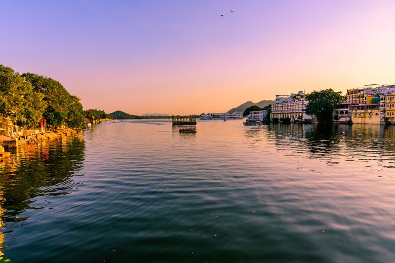 Panoramic view of the Arsi Villas in Lake Pichola from Ambrai Ghat.